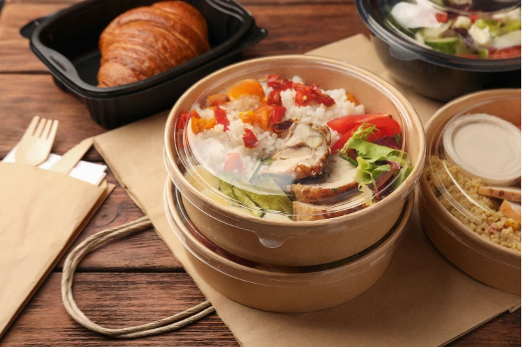 A bowl of food on top of a table.